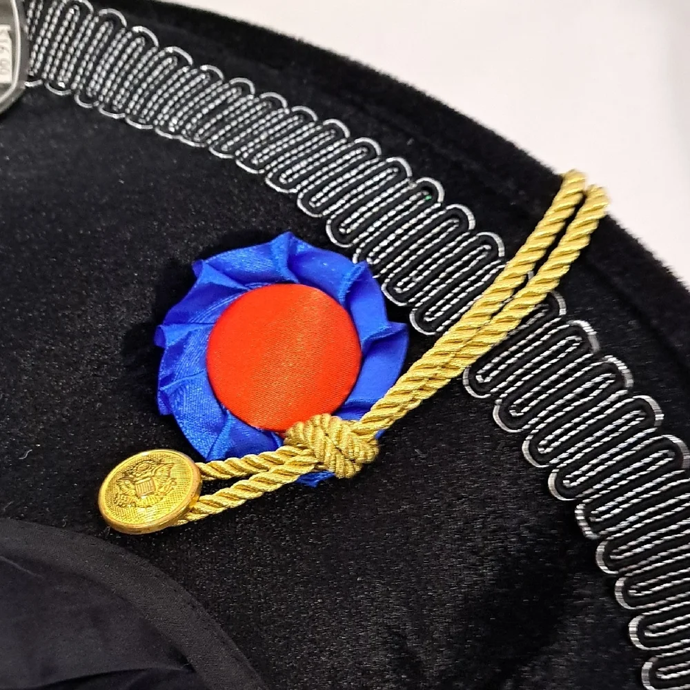 Majestic Black Hat with Blue and Gold Accents